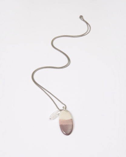 Elsita Jewelry Mauve I necklace featuring a smooth Hyacinth Jasper pendant with lavender tones and a clear quartz charm.