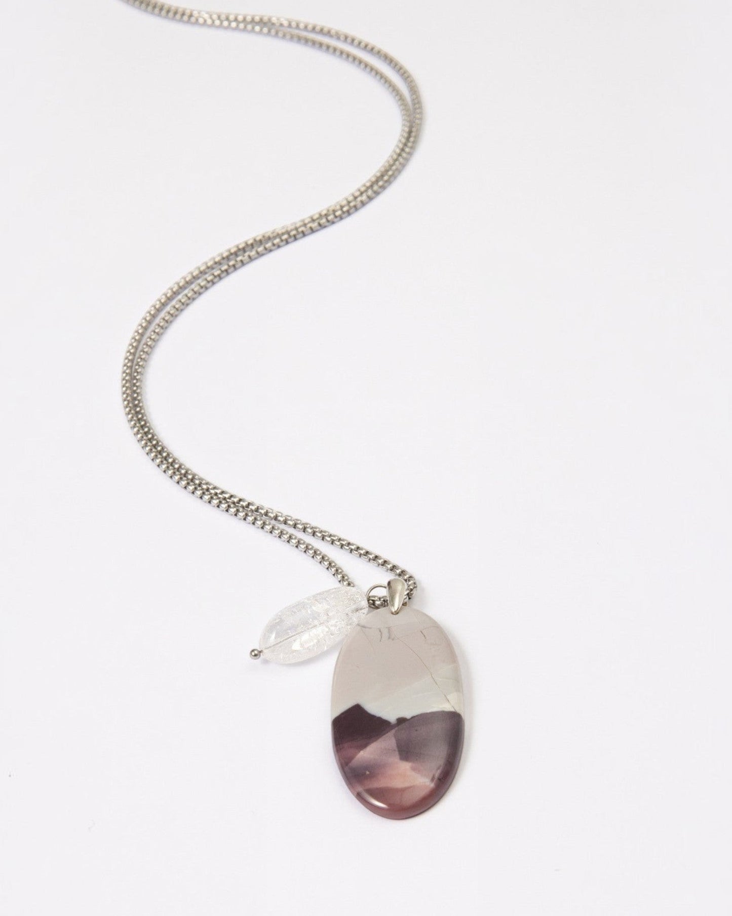 Elsita Jewelry Mauve III pendant necklace featuring a Hyacinth Jasper stone and clear quartz on a silver chain.