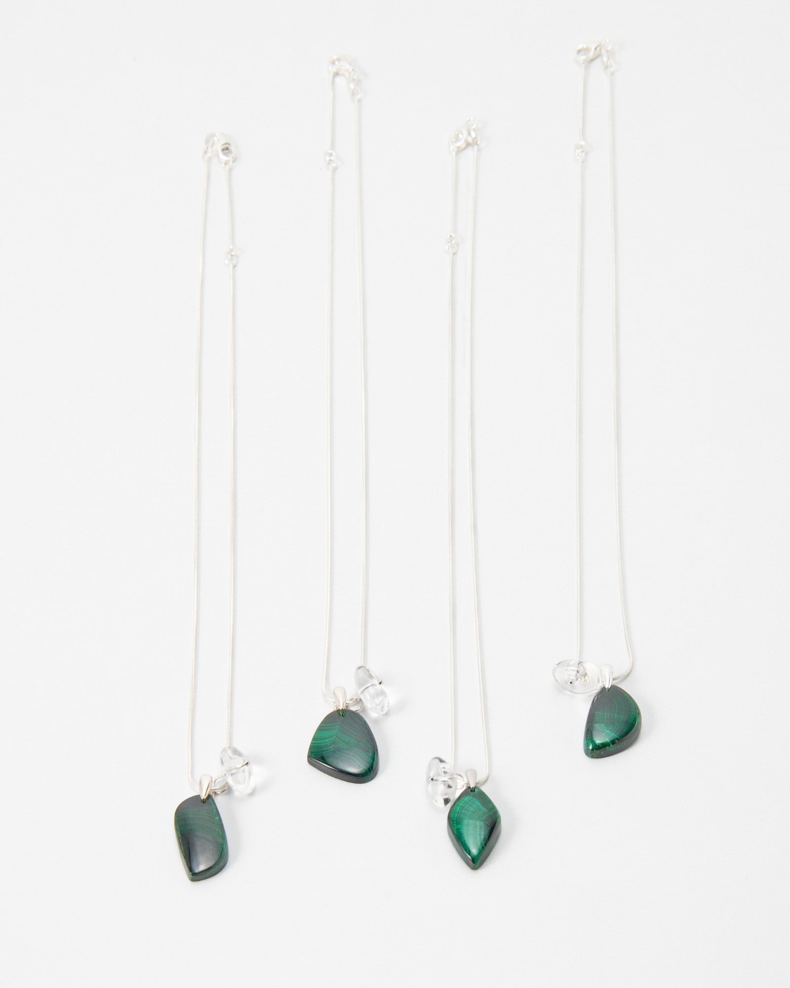 Elsita Jewelry Midnight necklaces featuring dark green stone pendants on delicate silver chains