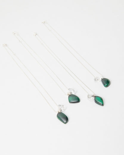 Elsita Jewelry Midnight necklaces featuring polished green malachite teardrop pendants on delicate silver chains.