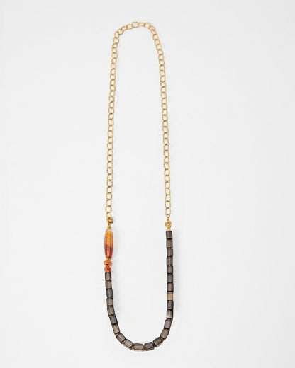 Elsita Jewelry Mosaic long necklace featuring a gold chain, smoky quartz cubes, and faceted red agate and hematite beads.