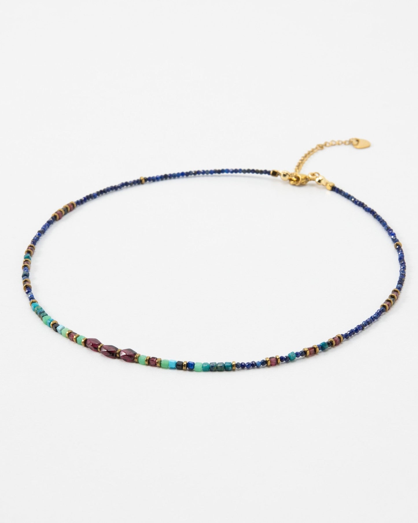 Elsita Jewelry Nomad choker featuring a delicate strand of multicolored natural mineral beads including garnet and turquoise