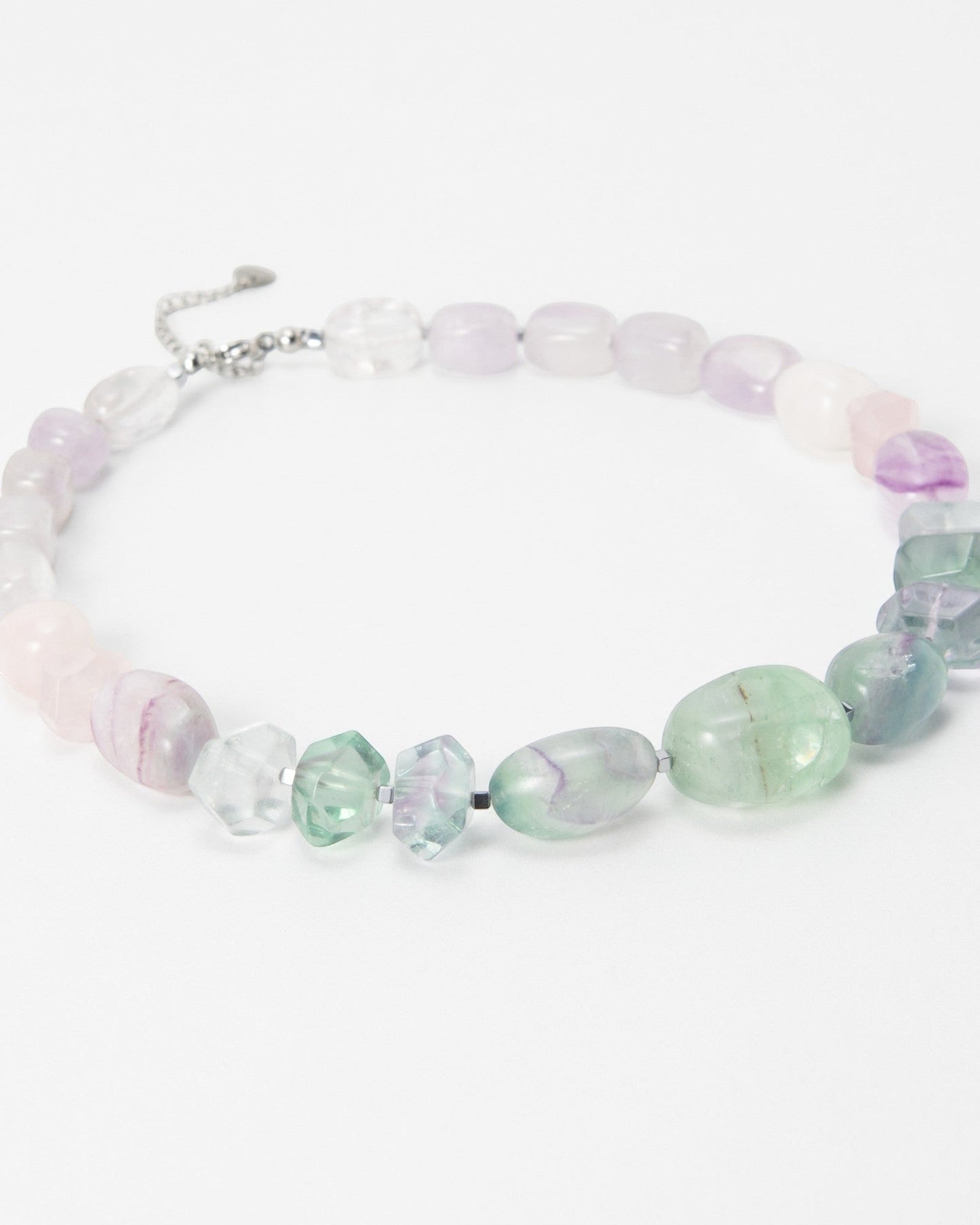 Elsita Jewelry Pastel necklace featuring smooth and faceted multi-coloured fluorite gemstone beads on a silver chain.