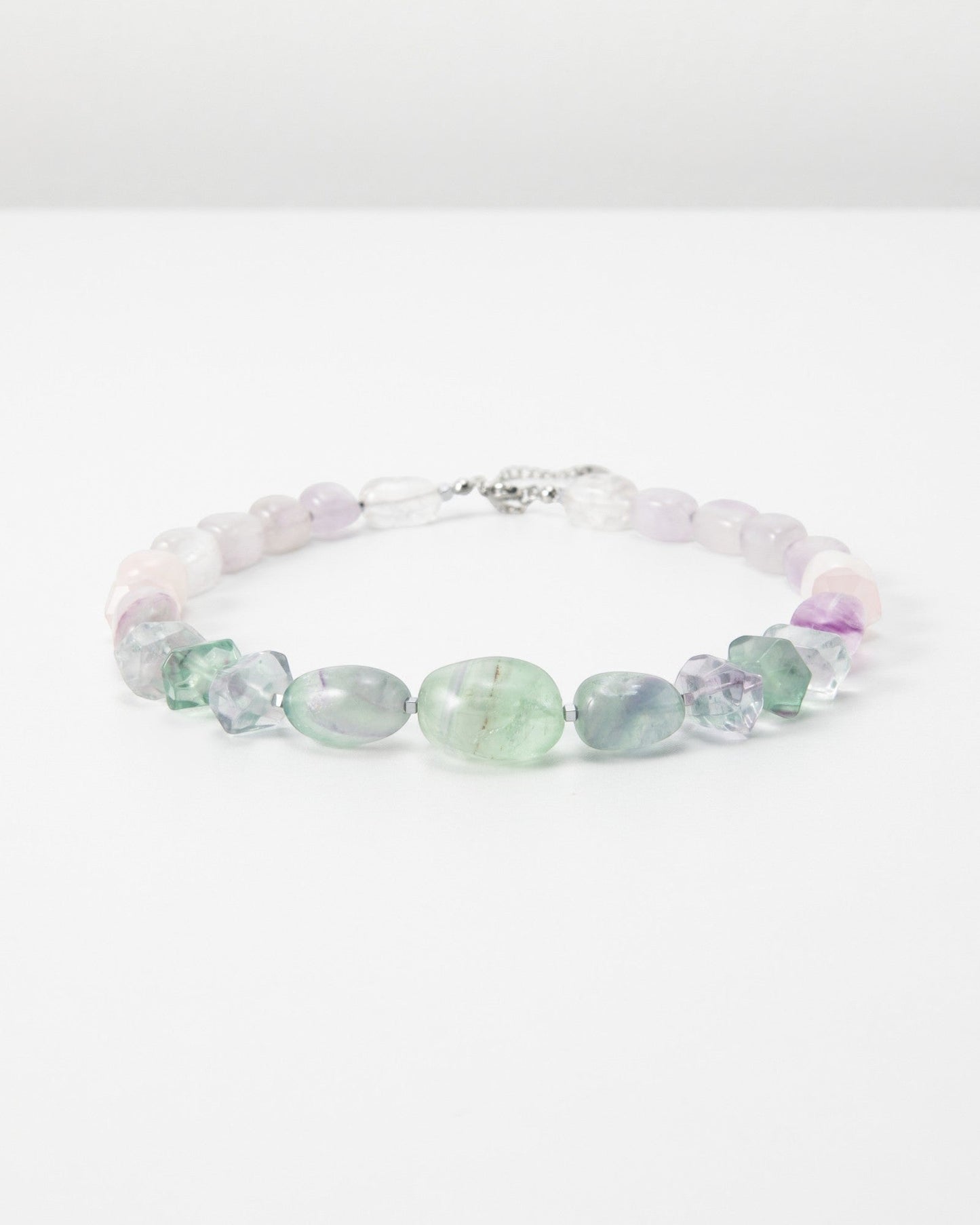 Elsita Jewelry Pastel bracelet featuring polished multi-coloured fluorite gemstone beads on a white background.