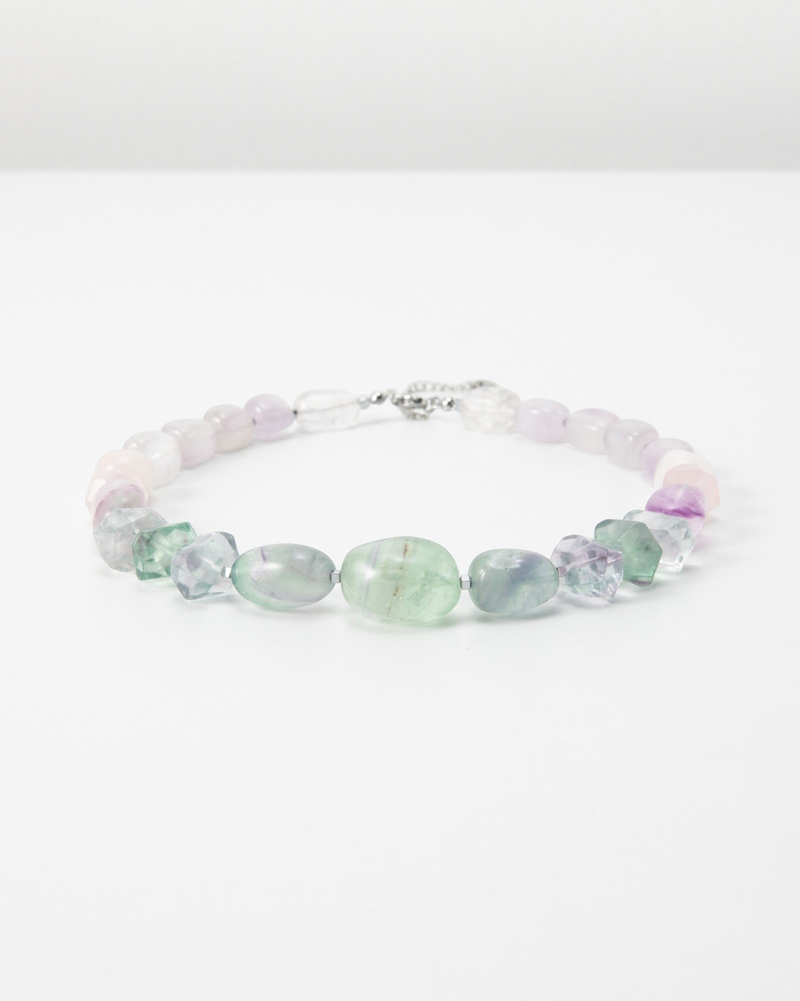 Elsita Jewelry Pastel bracelet featuring polished multi-coloured fluorite gemstone beads on a white background.