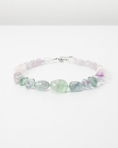 Elsita Jewelry Pastel bracelet featuring polished multi-coloured fluorite gemstone beads on a white background.