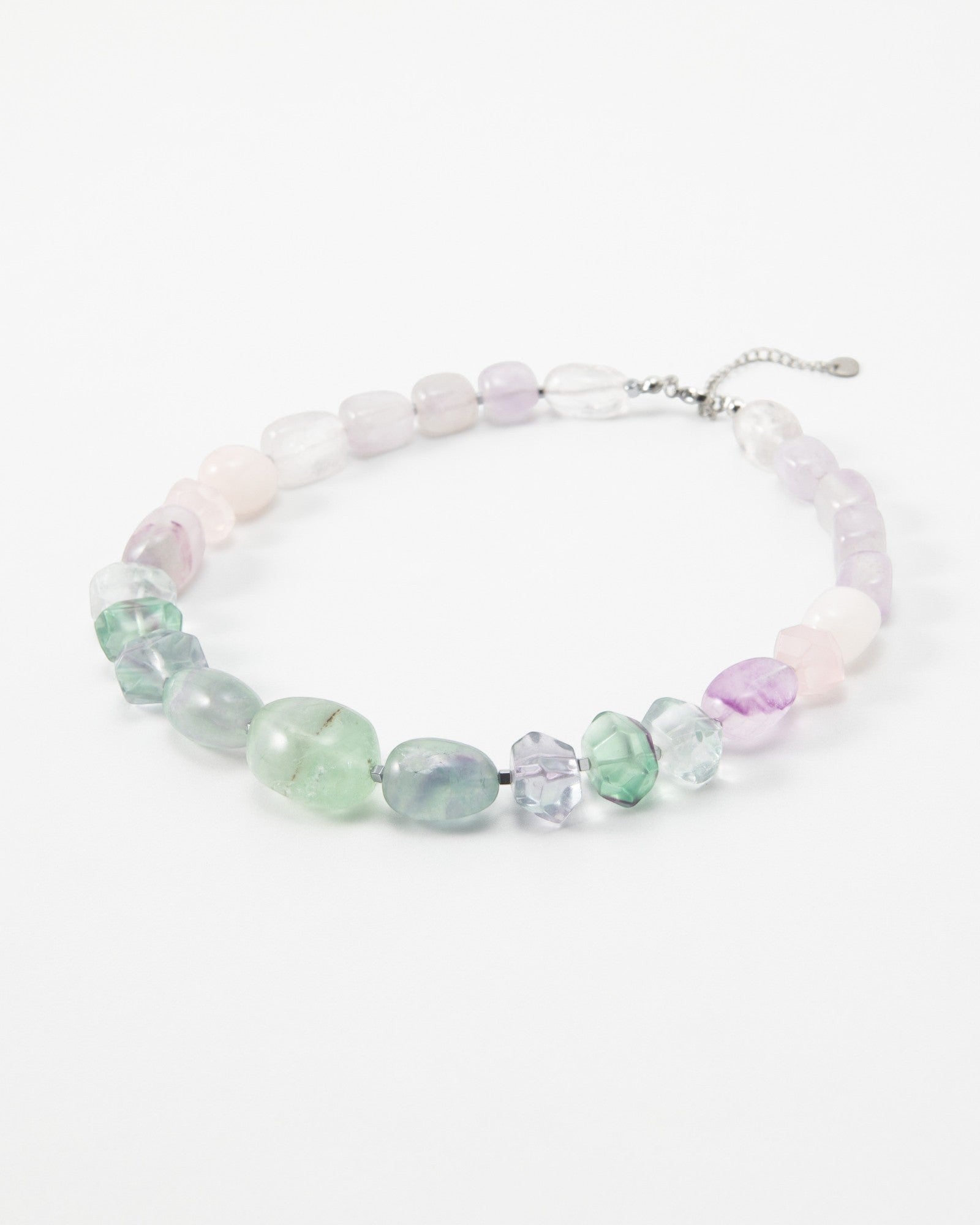 Elsita Jewelry Pastel necklace featuring smooth and faceted multi-coloured fluorite gemstone beads on a silver chain.