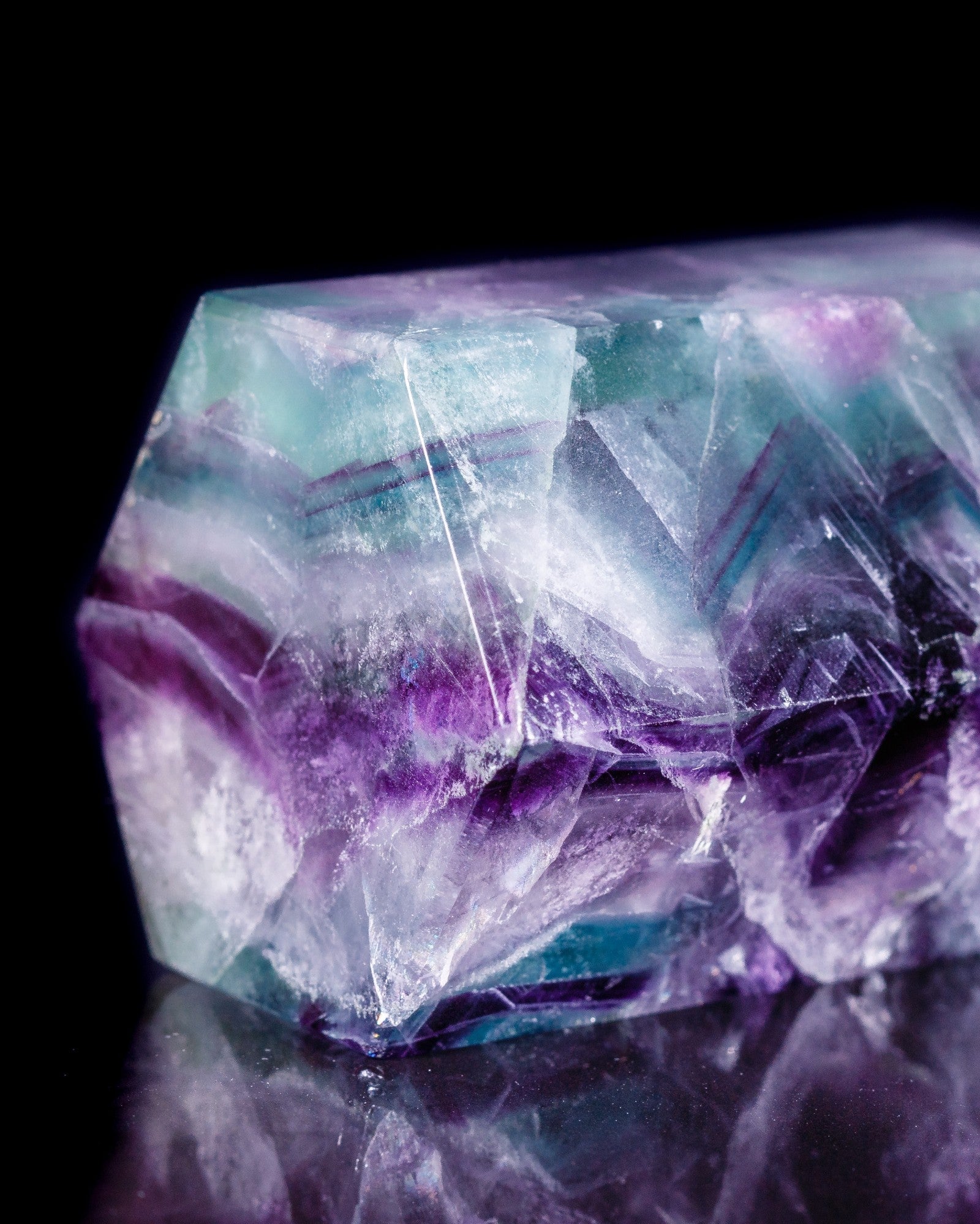 Elsita Jewelry Pastel necklace featuring raw fluorite with vibrant purple, violet, and green crystalline textures.