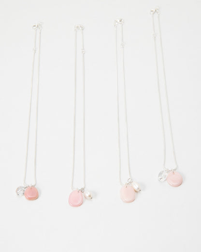Elsita Jewelry Petal Pearl necklaces featuring delicate pink stone charms and white pearls on silver chains