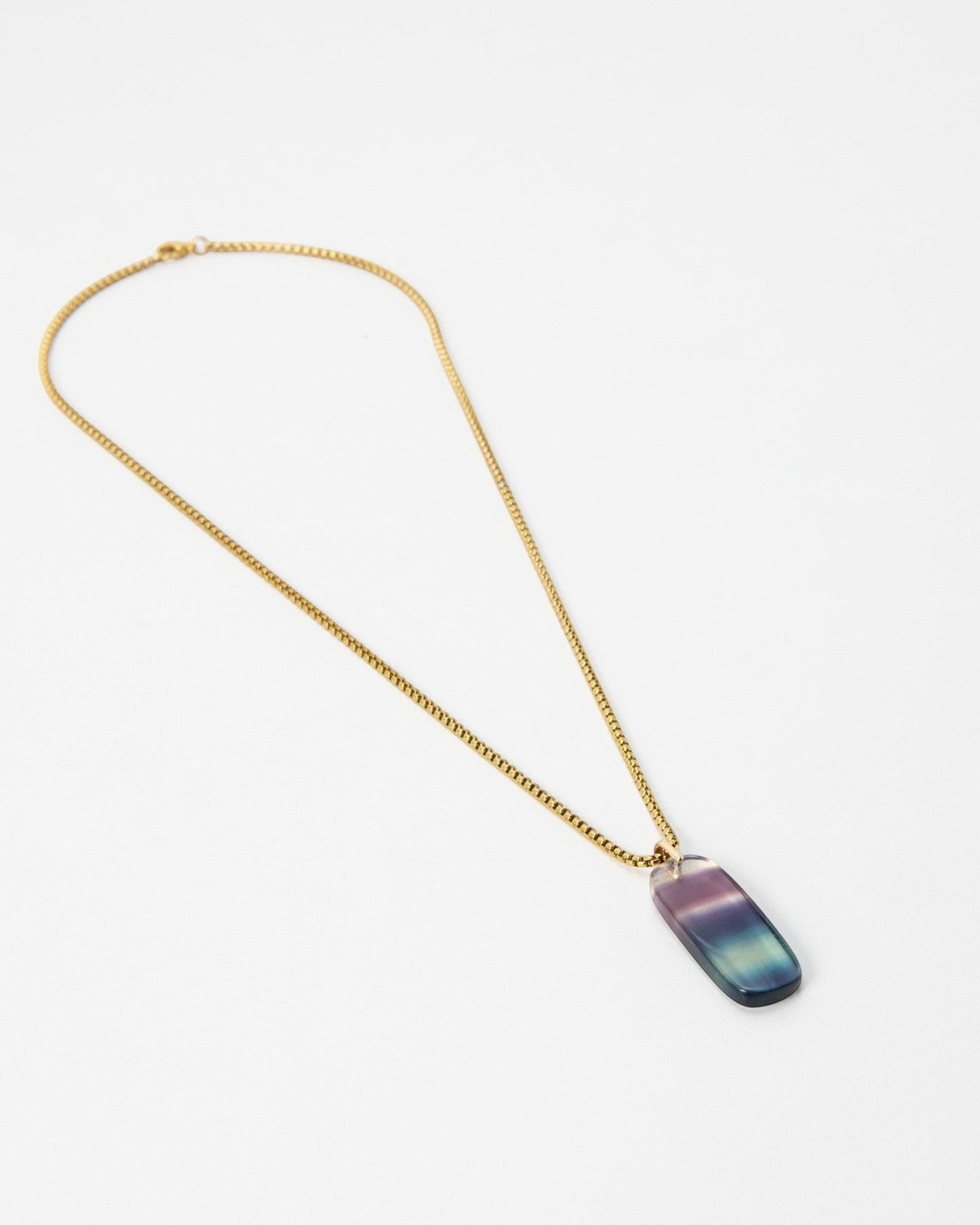 Elsita Jewelry Rainbow necklace featuring a rectangular gradient fluorite pendant on a delicate gold chain