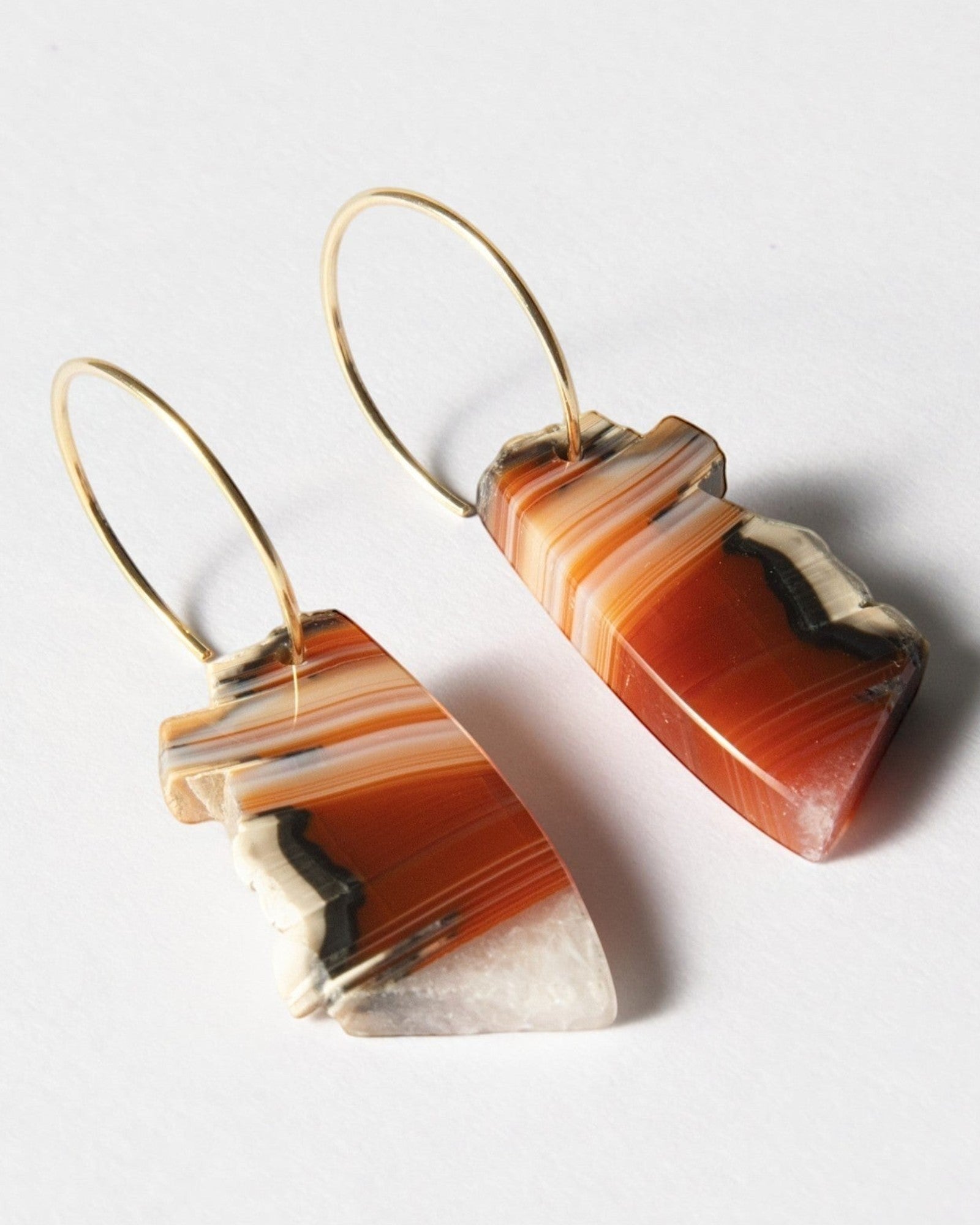 Elsita Jewelry Wild 17 raw Indonesian agate slice earrings on 14K gold-filled hoops with natural banded earth tones.