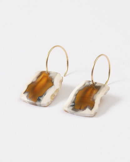 Elsita Jewelry Wild 20 raw Indonesian agate slice earrings on 14K gold-filled hoops with earthy brown and beige banding.