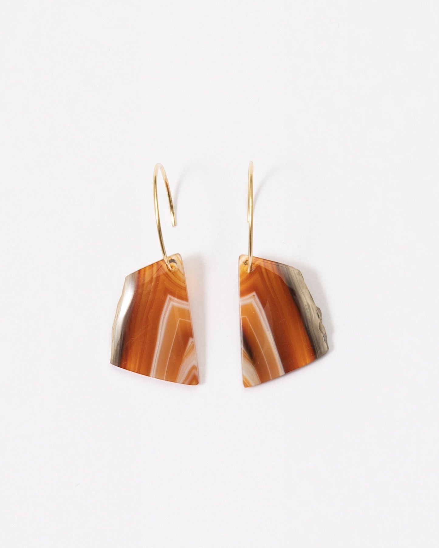 Elsita Jewelry Wild 11 earrings featuring raw, freeform Indonesian agate slices on 14K gold-filled hoops.