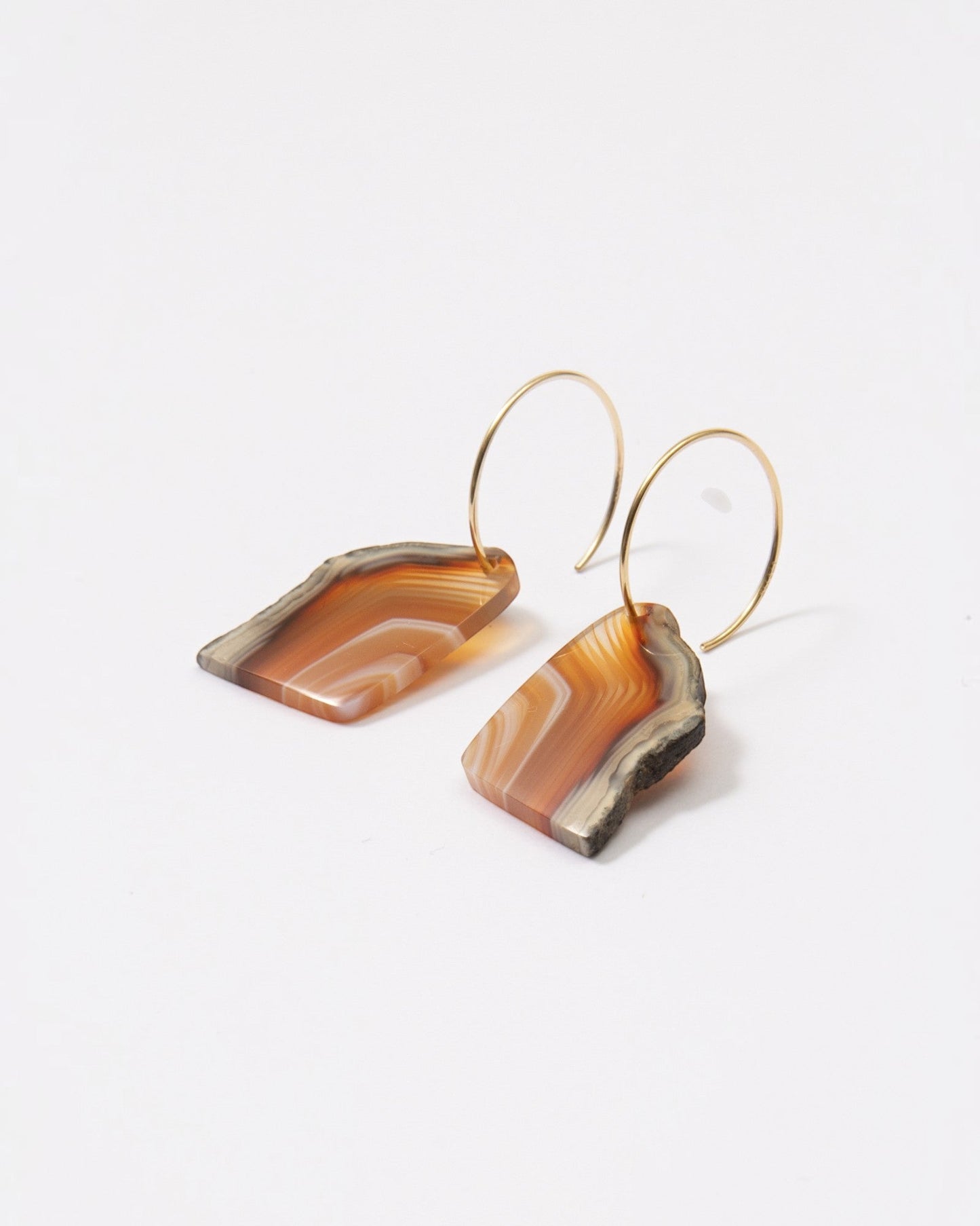 Elsita Jewelry Wild 7 raw Indonesian agate slice earrings on 14K gold-filled hoops with natural earthy banding.