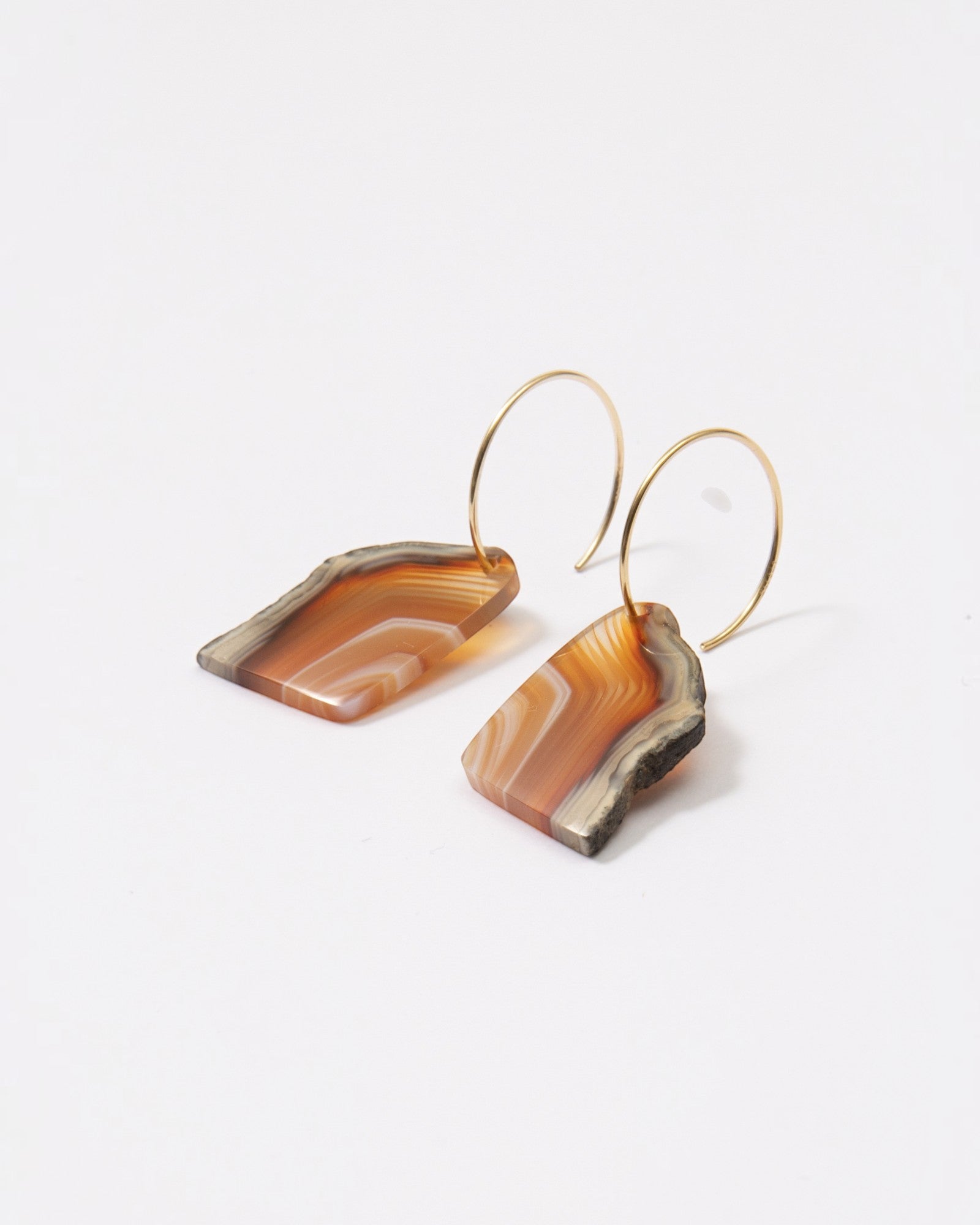 Elsita Jewelry Wild 7 raw Indonesian agate slice earrings on 14K gold-filled hoops with natural earthy banding.