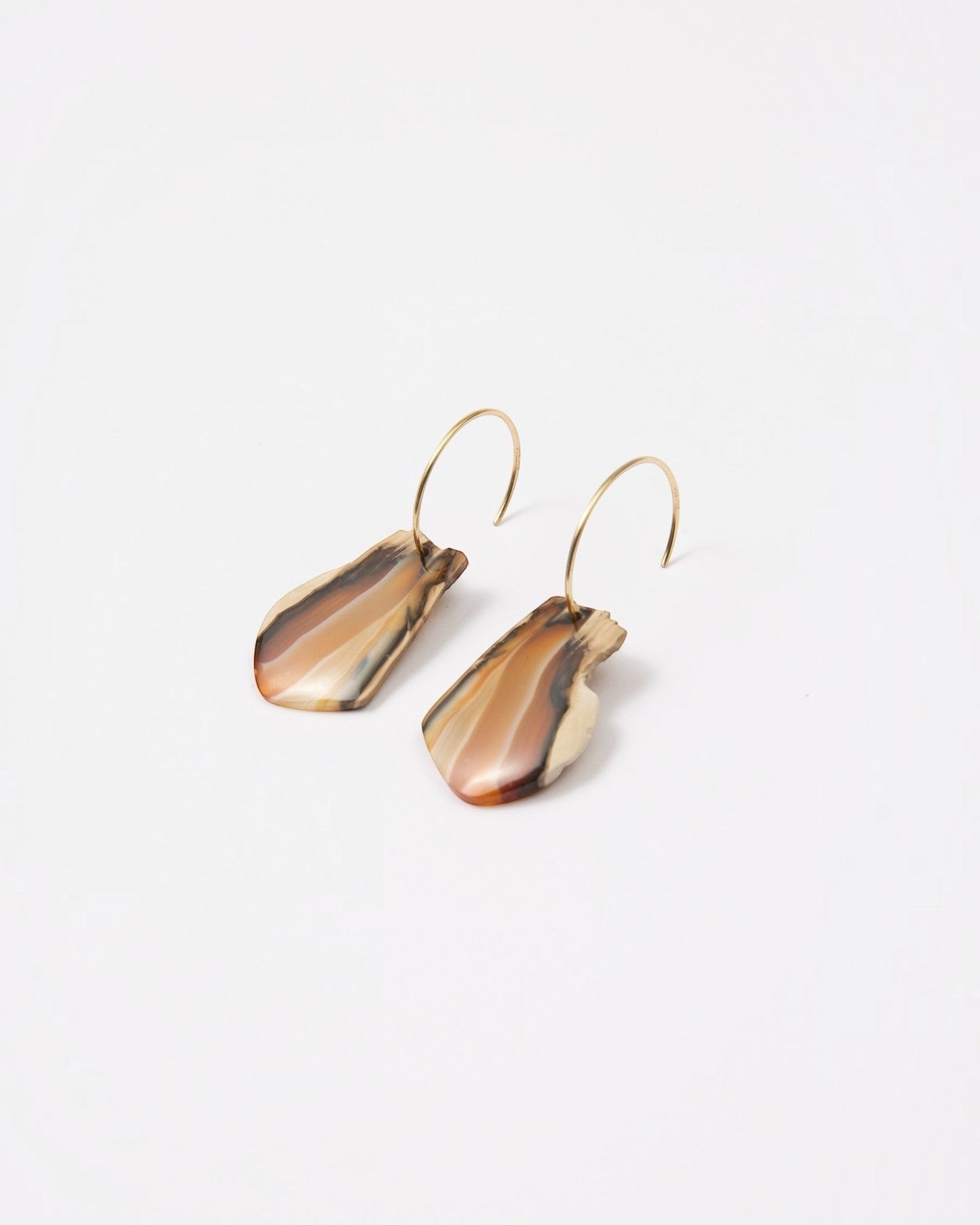 Elsita Jewelry Wild 1 earrings featuring raw, freeform Indonesian agate slices on 14K gold-filled hoops.
