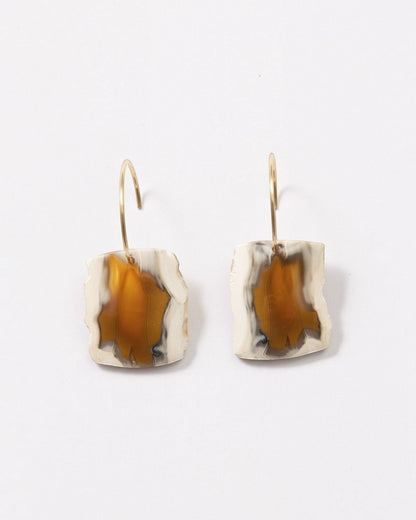 Elsita Jewelry Wild 20 raw Indonesian agate slice earrings on 14K gold-filled hoops with earthy beige and orange tones.