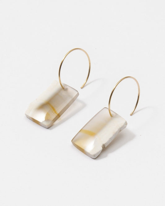 Elsita Jewelry Wild 12 earrings featuring raw Indonesian agate slices on 14K gold-filled hoops with earthy banding.