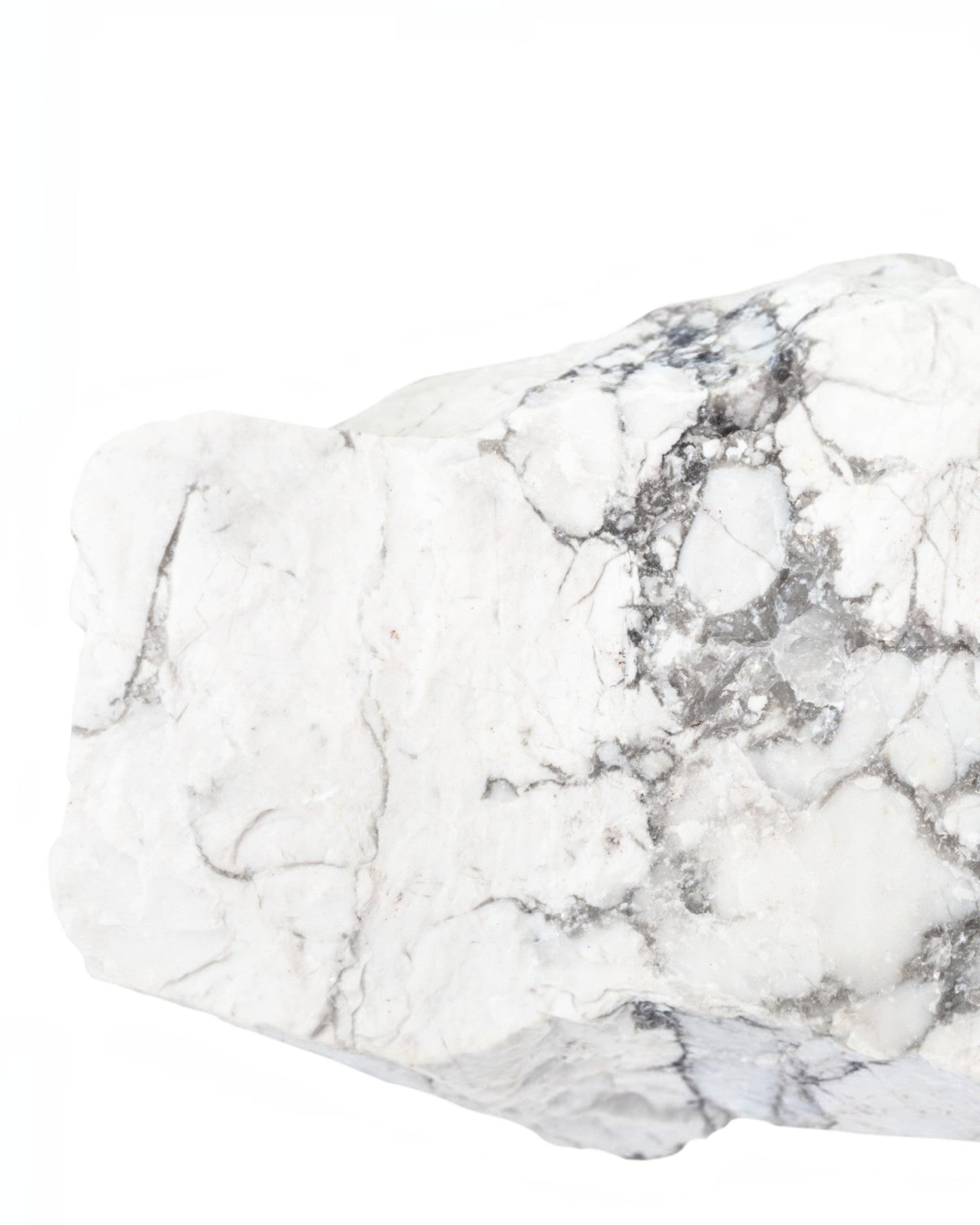 Elsita Jewelry raw white howlite stone with grey marble-like veining isolated on a white background