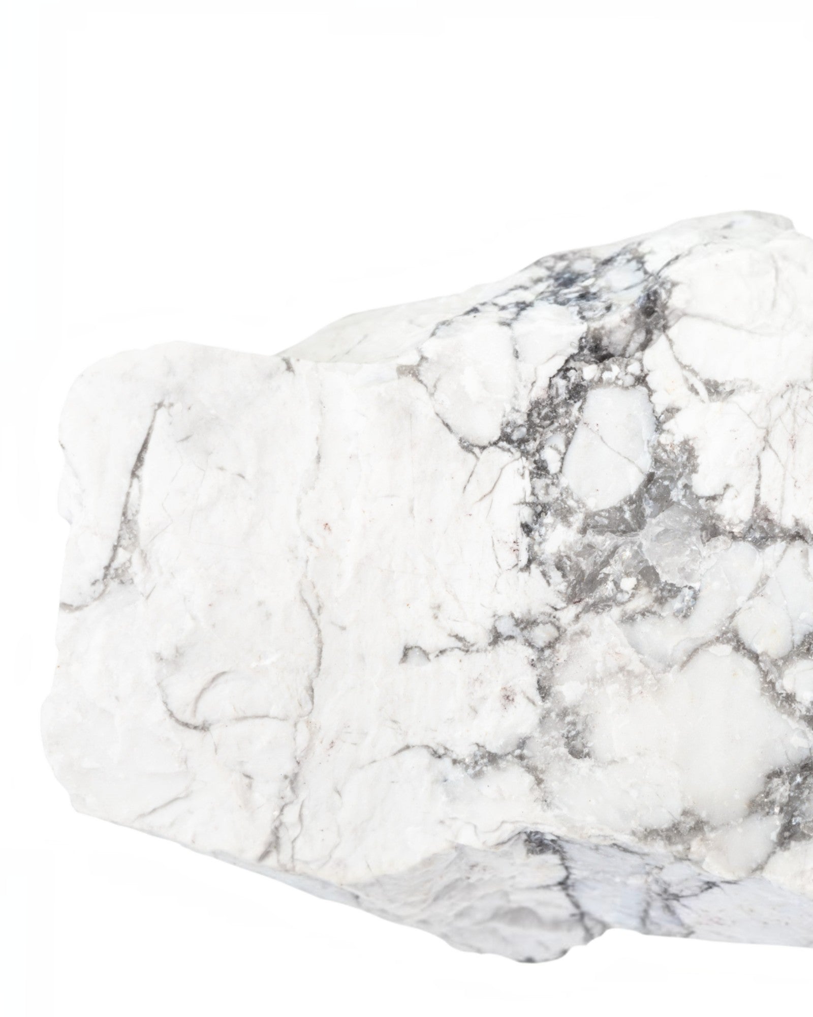 Elsita Jewelry raw white howlite stone with grey marble-like veining isolated on a white background