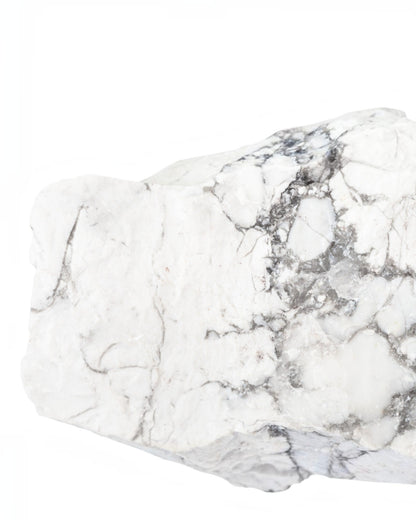 Elsita Jewelry raw white howlite stone with grey marble-like veining isolated on a white background