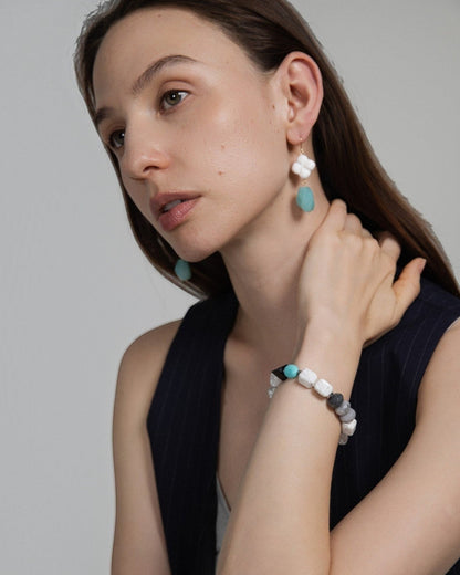 Elsita Jewelry Sky earrings featuring white clover-shaped agate and lagoon-blue amazonite on 14K gold-filled wire.