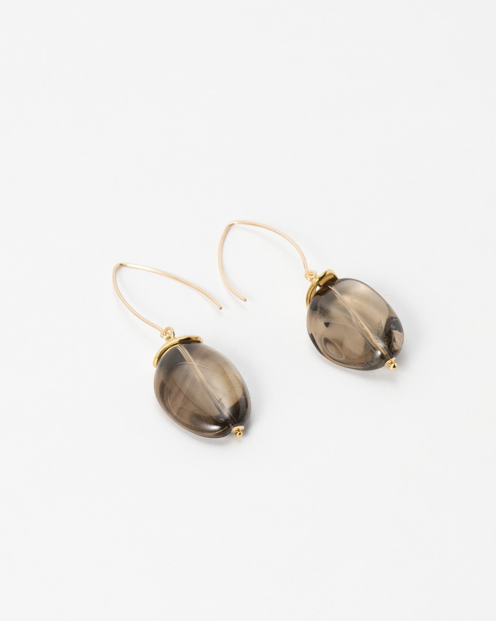 Elsita Jewelry Smoke earrings featuring translucent grey oval gemstone beads on delicate gold wire hooks.