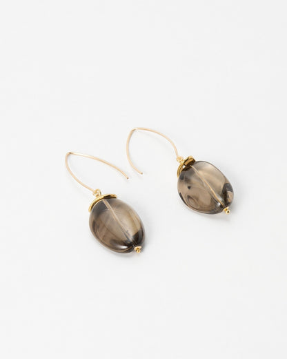 Elsita Jewelry Smoke earrings featuring translucent grey oval gemstone beads on delicate gold wire hooks.