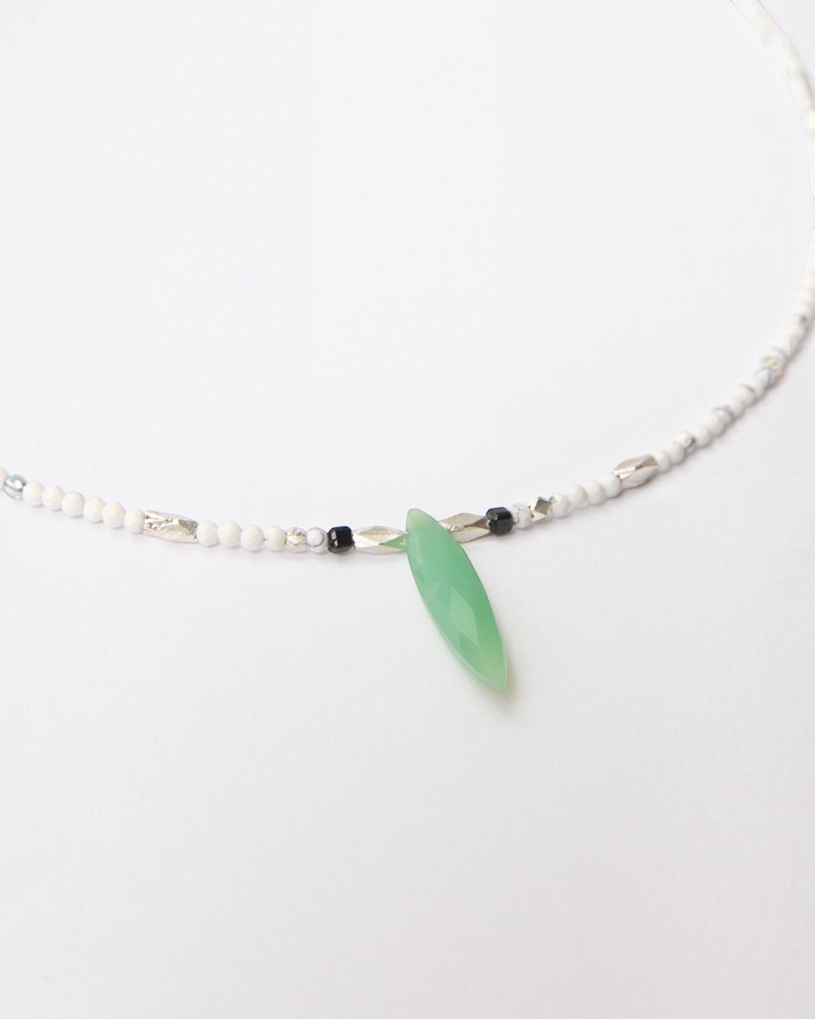 Elsita Jewelry Snowline Green necklace featuring white howlite beads, silver accents, and a green chrysoprase pendant.