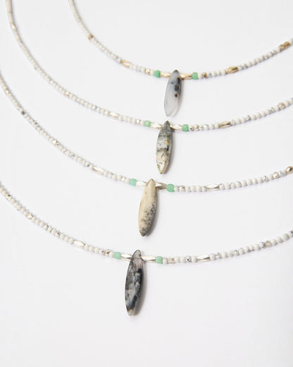 Elsita Jewelry Snowline Grey necklace featuring white howlite, grey agate, and green chrysoprase beads with silver.