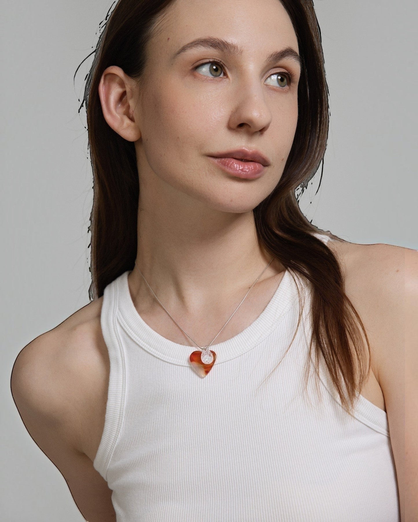 Elsita Jewelry Soda I heart-shaped red agate and clear quartz pendant necklace on a sterling silver snake chain.