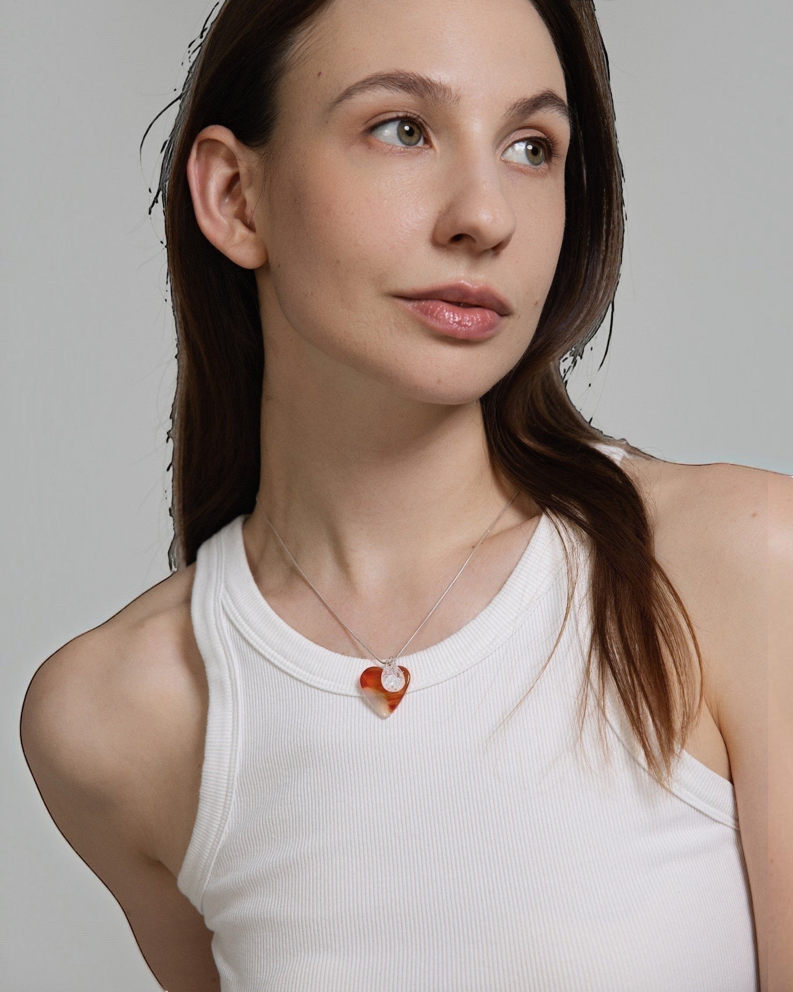 Elsita Jewelry Soda I heart-shaped red agate and clear quartz pendant necklace on a sterling silver snake chain.