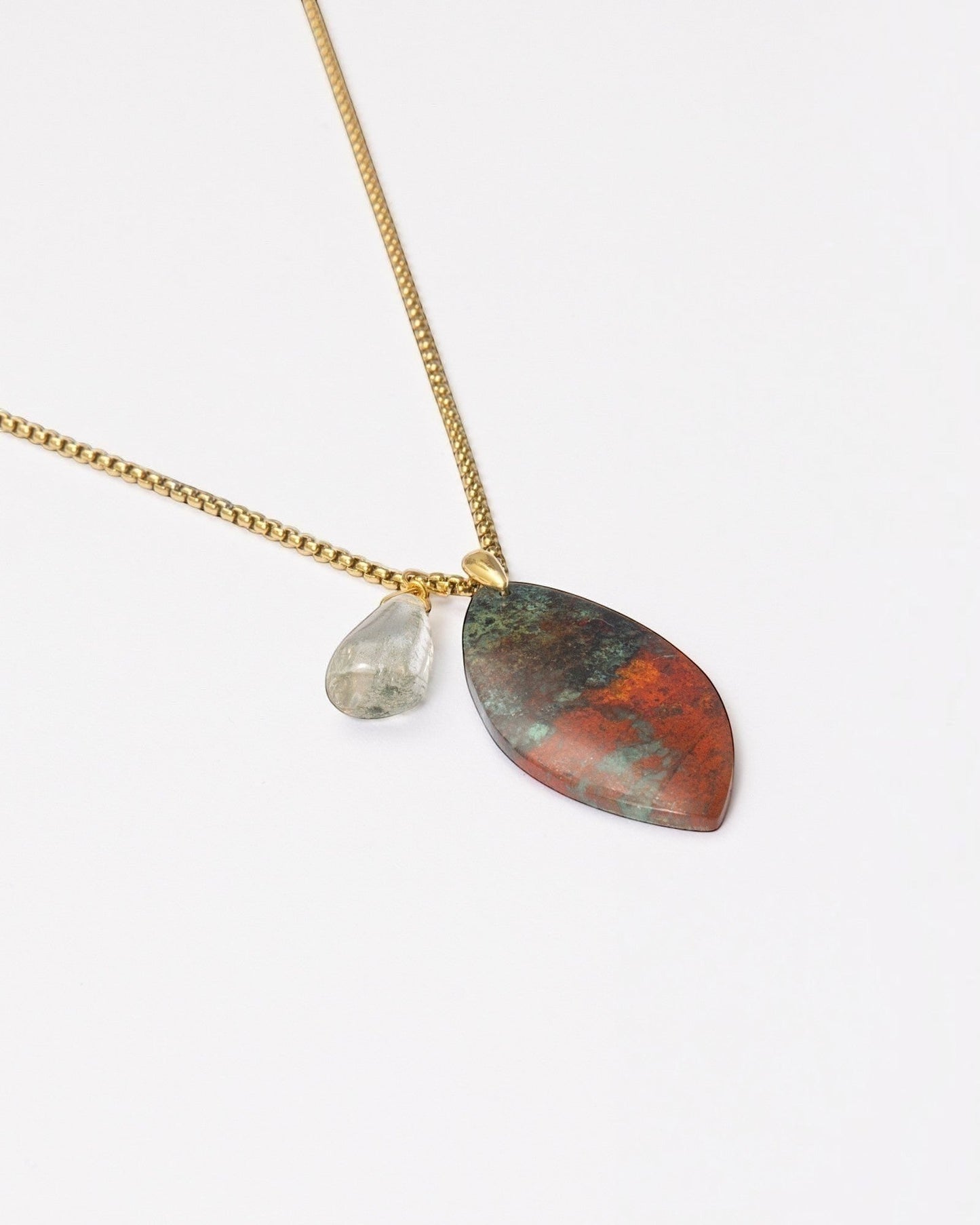 Elsita Jewelry Horizon I necklace featuring a marquise Sonora sunset stone and green quartz on a gold-tone chain.