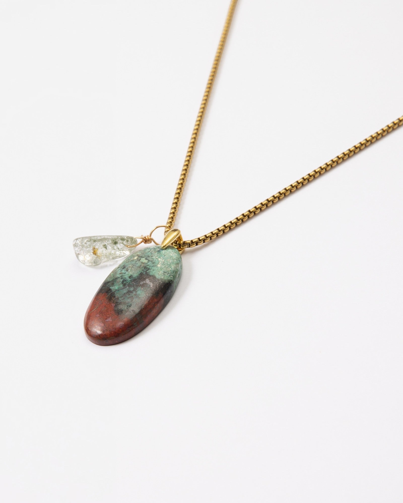 Elsita Jewelry Horizon III necklace featuring a Sonora sunset stone and green quartz pendant on a gold-tone chain.