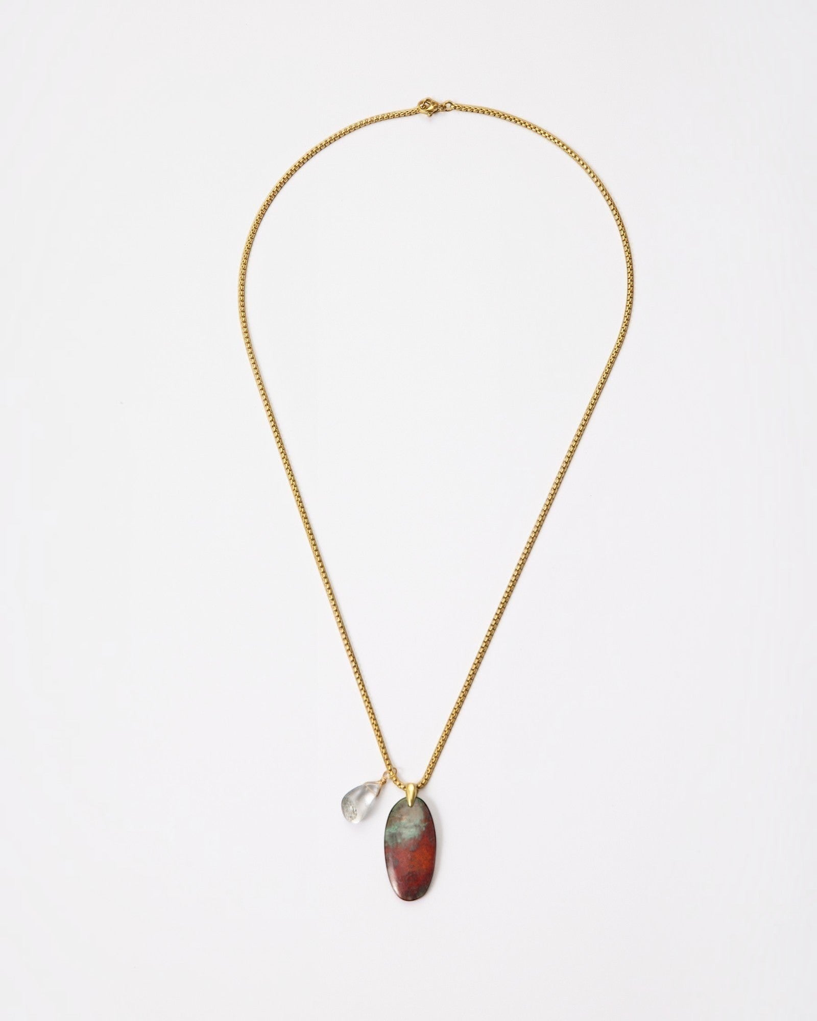 Elsita Jewelry Horizon IV necklace featuring an oval Sonora sunset stone and green quartz on a gold-tone chain.
