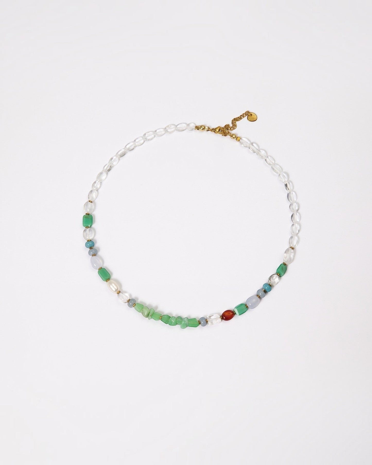 Elsita Jewelry Spring necklace featuring chrysoprase, freshwater pearls, and mixed minerals on a gold-tone chain.