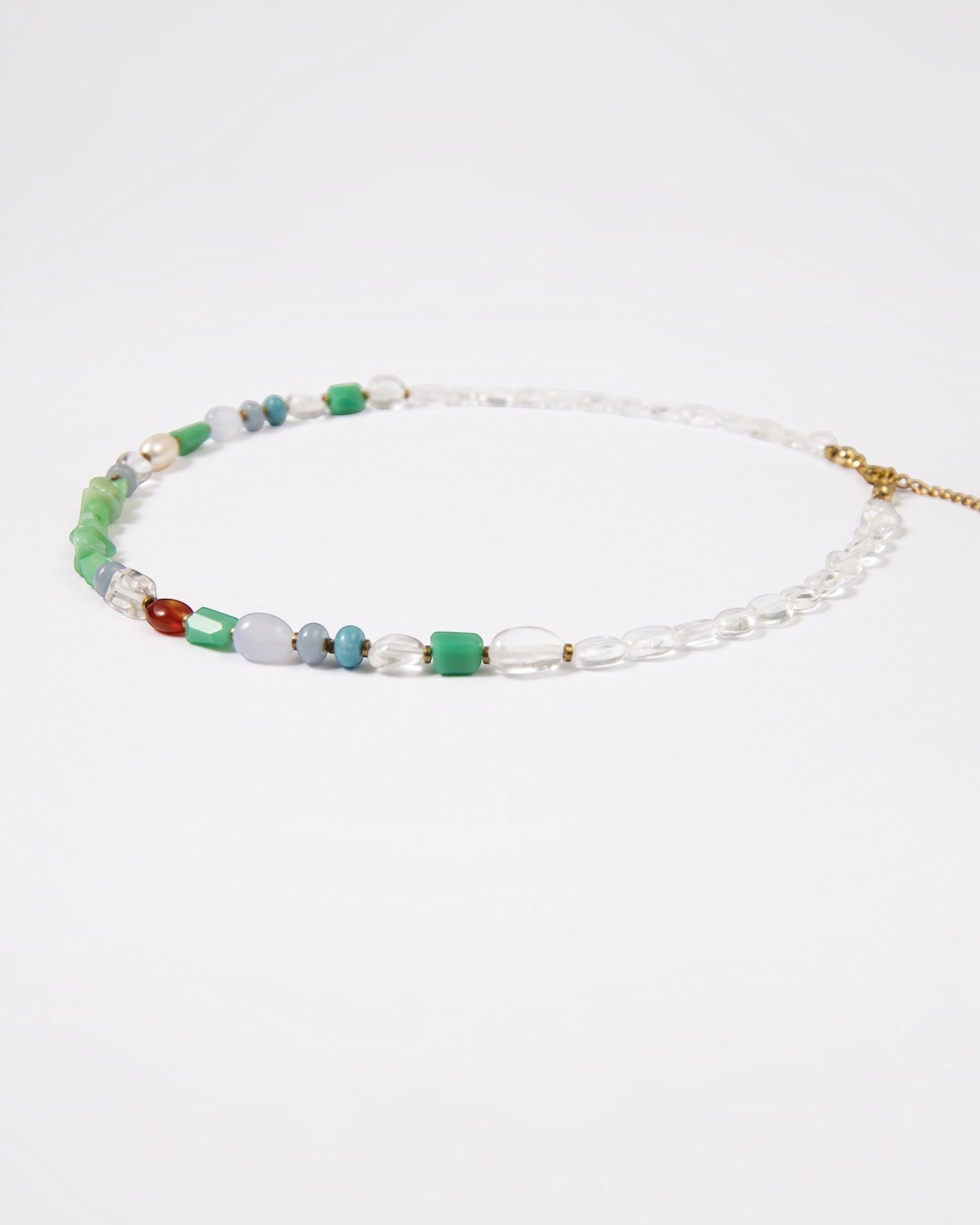 Elsita Jewelry Spring necklace featuring mixed minerals like chrysoprase, larimar, and pearl on a delicate chain.