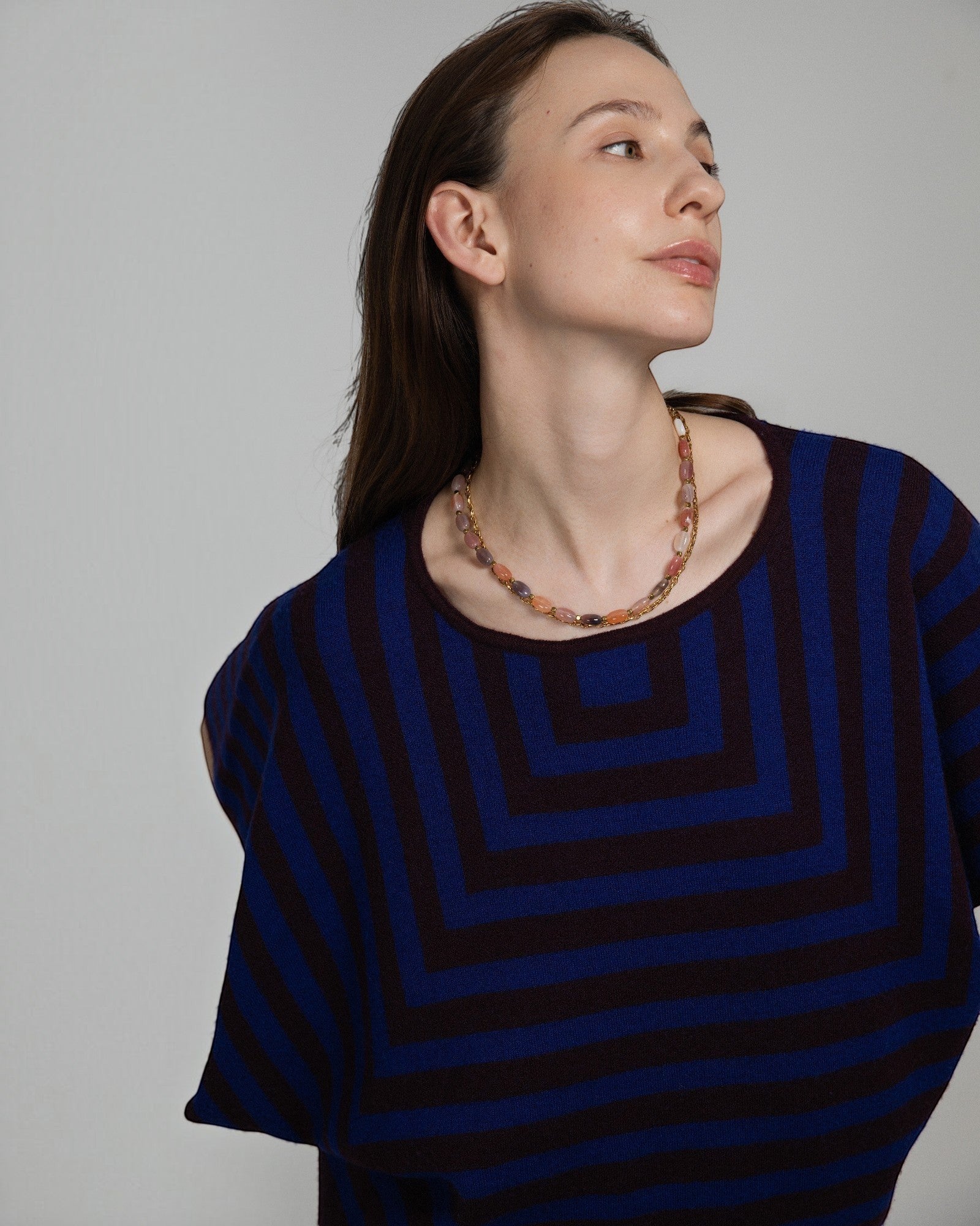 Elsita Jewelry Terrain necklace featuring oval mixed agate stones and gold-tone chain worn as a double-layered choker