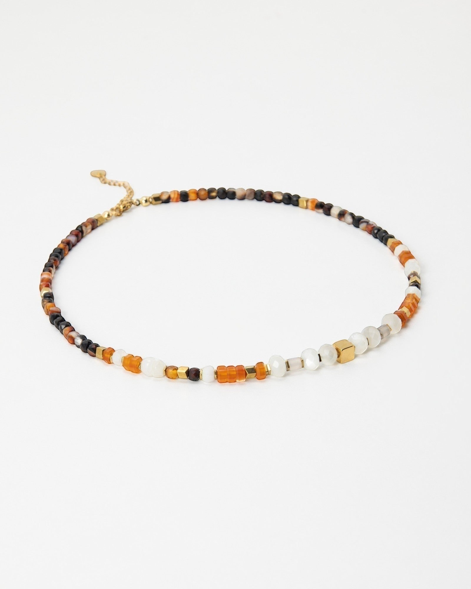 Elsita Jewelry Untamed beaded choker necklace with multi-colored gemstones, pearls, and gold-tone accents.