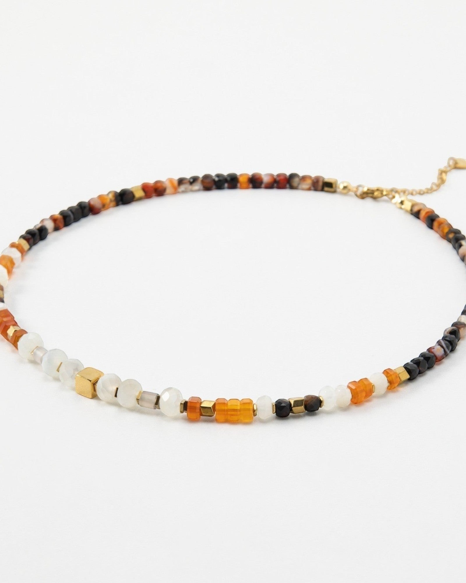 Elsita Jewelry Untamed beaded necklace featuring multi-colored gemstone beads and small gold-tone metal accents