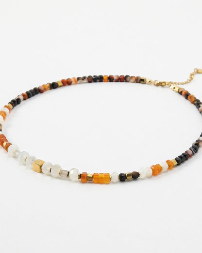 Elsita Jewelry Untamed beaded necklace featuring multi-colored gemstone beads and small gold-tone metal accents