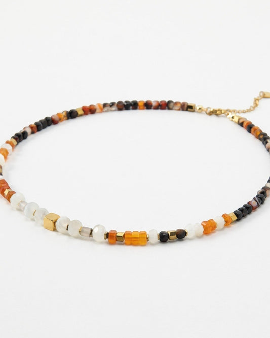 Elsita Jewelry Untamed beaded necklace featuring multi-colored gemstone beads and small gold-tone metal accents