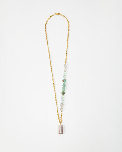Elsita Jewelry Wandern necklace featuring a gold chain with green and clear gemstone beads and a rectangular pendant