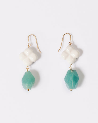 Elsita Jewelry Sky earrings featuring faceted lagoon-blue Amazonite and white clover-shaped Agate on 14K gold hooks.