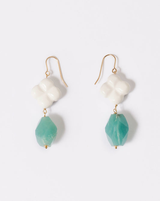 Elsita Jewelry Sky earrings featuring faceted lagoon-blue Amazonite and white clover-shaped Agate on 14K gold hooks.