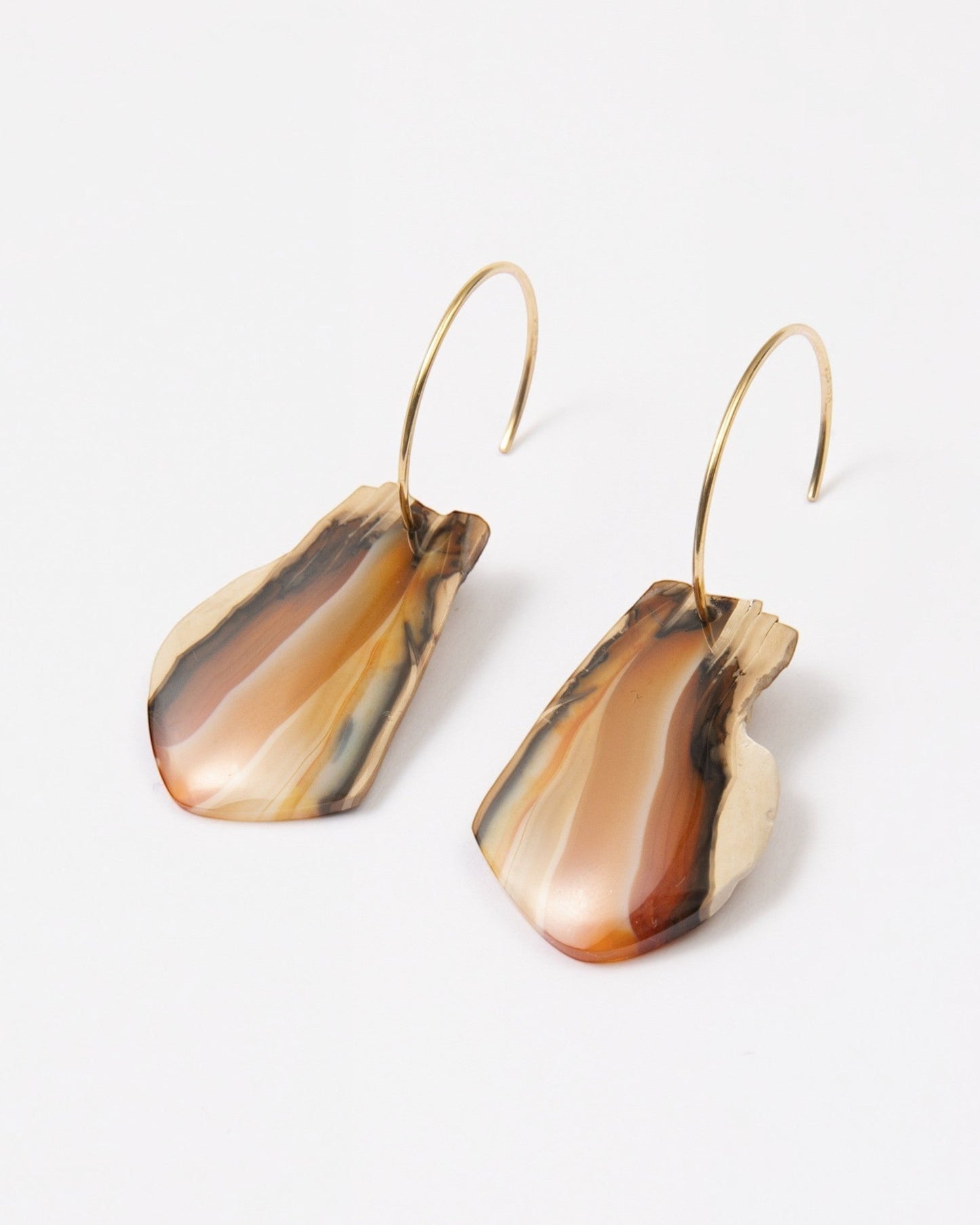 Elsita Jewelry Wild 1 earrings featuring raw, freeform Indonesian agate slices on 14K gold-filled hoops.